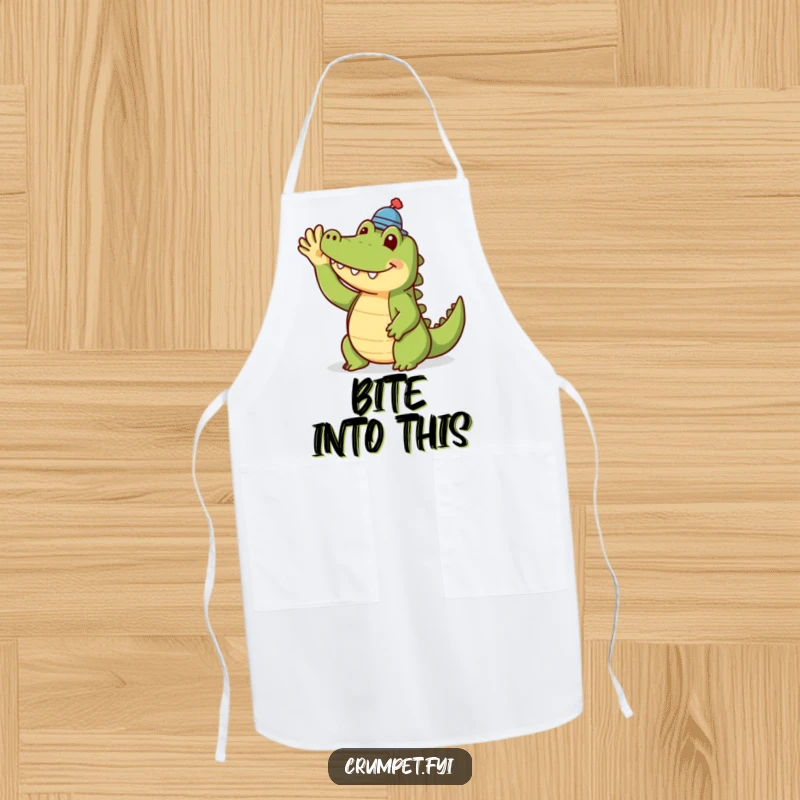Funny crocodile apron showing a smiling crocodile in a tiny hat, ready for kitchen duties. A humorous and practical item for cooks.