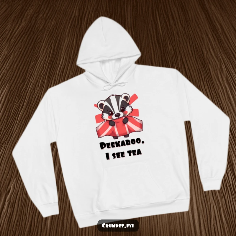 Funny badger hoodie, warm winter apparel, curious animal peeking from teapot, humorous graphic, gift for tea enthusiasts.