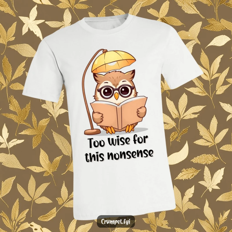 Funny T-Shirt featuring a smiling spectacled owl reading a book under a lamp, celebrating wisdom and the joy of learning.