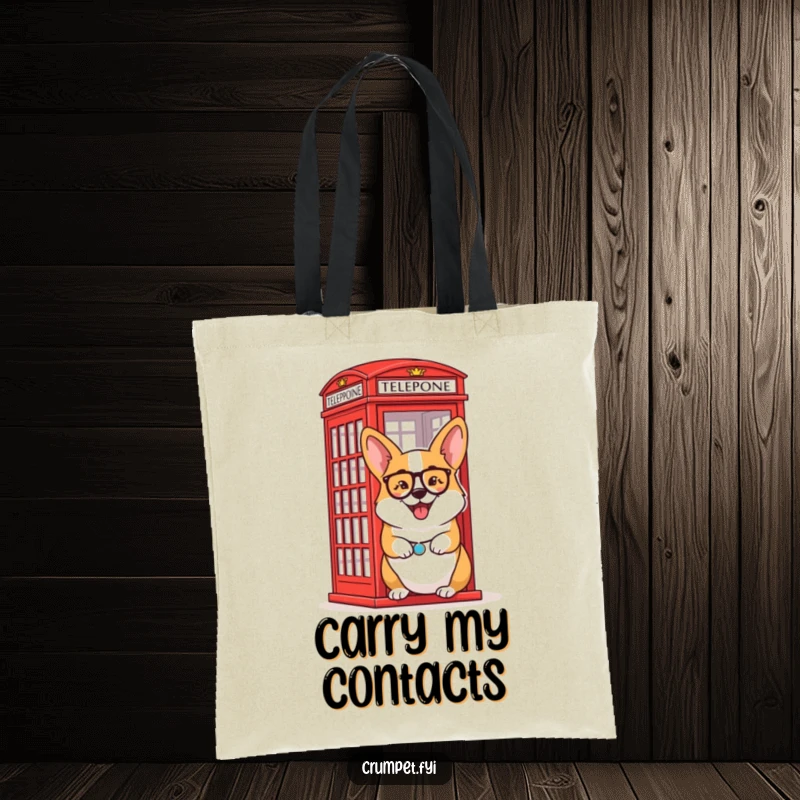 Funny Tote Bag: A delighted corgi wearing a monocle winks beside a classic red telephone box.